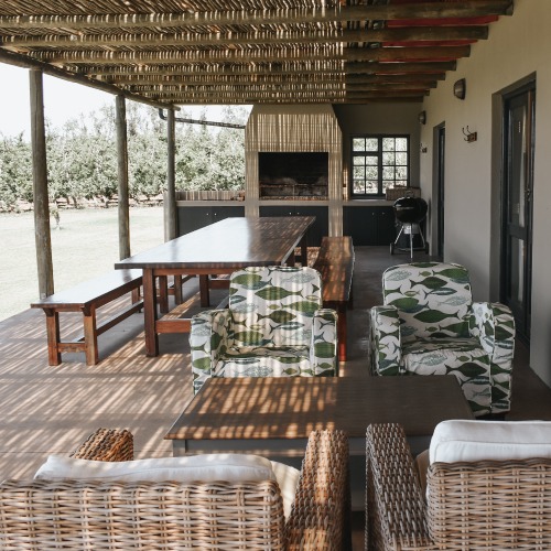 Covered outdoor dining area at Lake Lodge