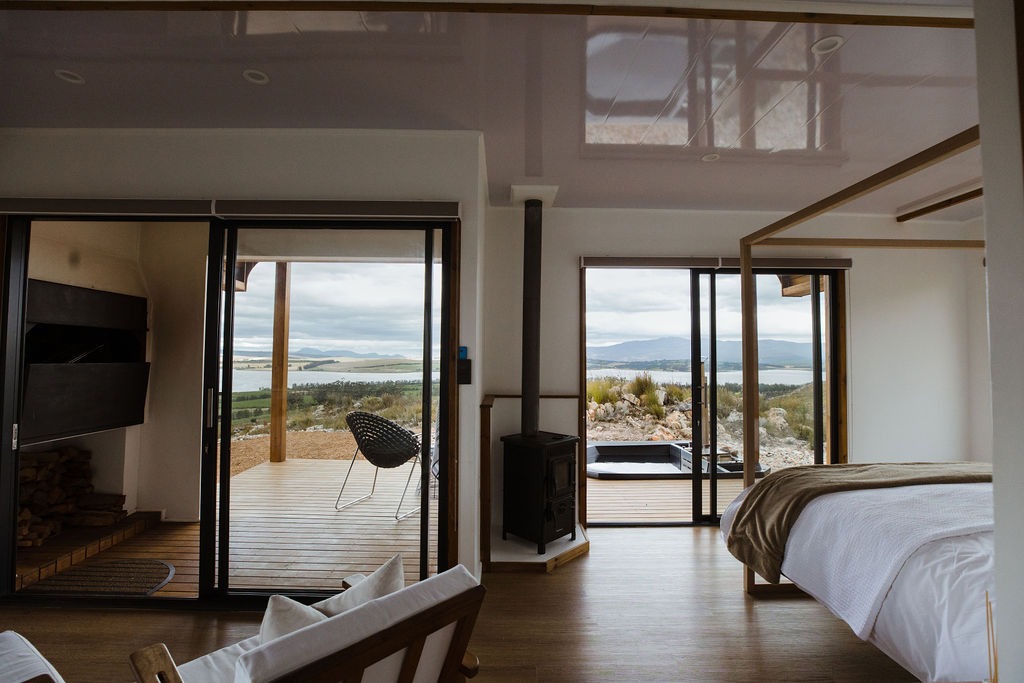 Bedroom and deck at Luna Pod overlooking the dam