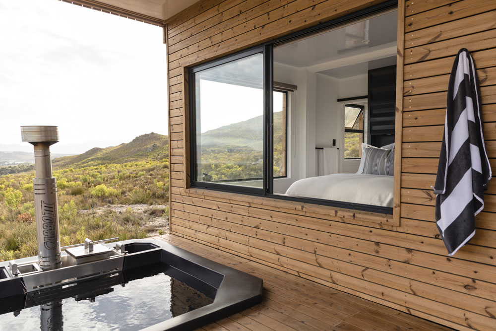 Wood-fired hot tub outside Leda Pod