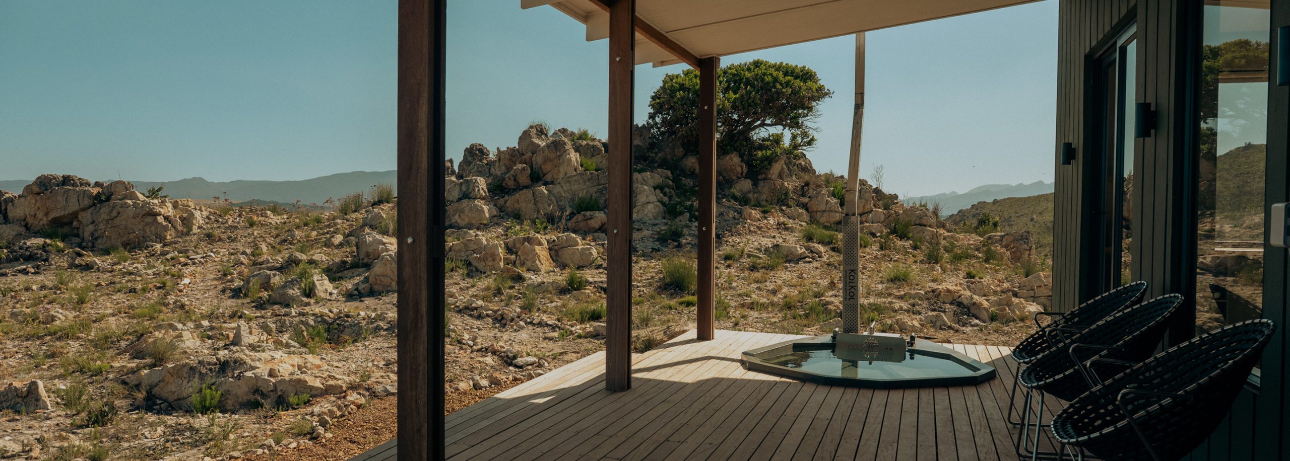 Wood-fired hot tub on the private deck at Sola Pod